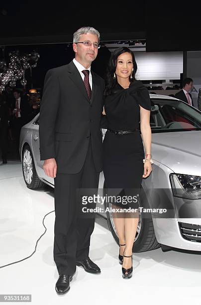 Rupert Stadler and Lucy Liu attend 'The Art of Progress' World-premiere of the new Audi A8 at the Audi Pavilion on November 30, 2009 in Miami,...