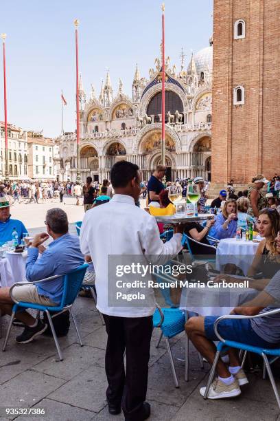 The famous Florian caffe in Piazza San Marco with the famous Basilica at back.