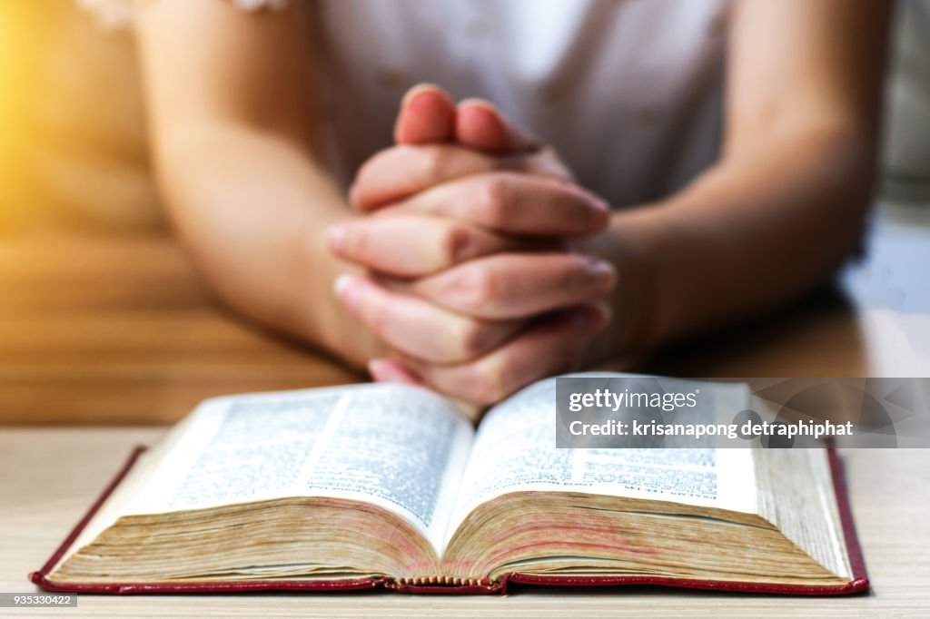 Women reading the Holy Bible., reading a book.,reading