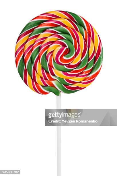 colorful candy on a stick isolated on white background - lutscher stock-fotos und bilder