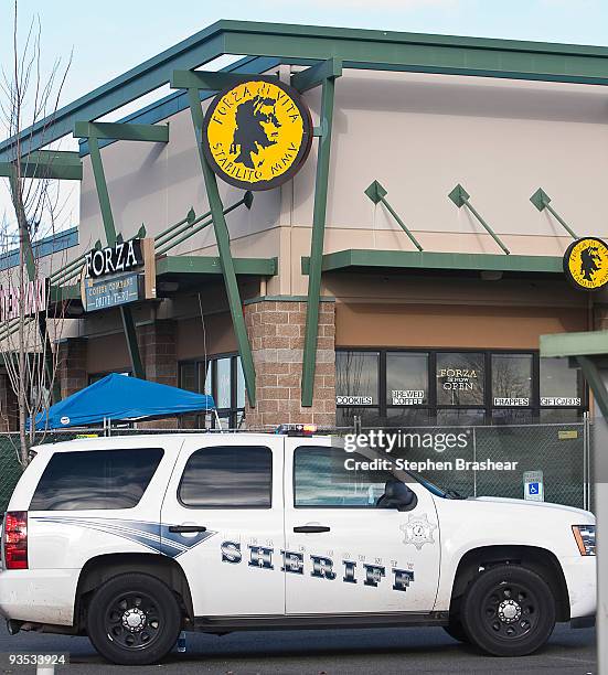 Pierce County Sheriff's Department vehicle sits outside of the Forza Coffee Company shop December 1, 2009 near Lakewood, Washington. The company has...