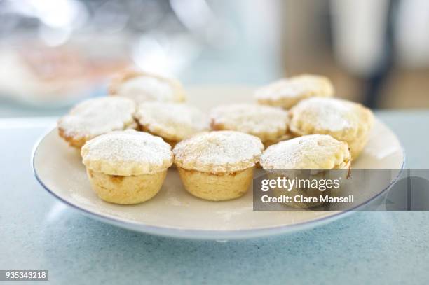 plate of mini apple pies - apple cake stock pictures, royalty-free photos & images