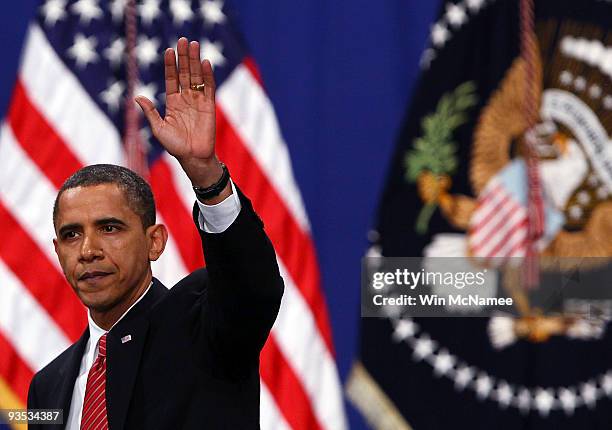 President Barack Obama waves at the conclusion of his speech at the U.S. Military Academy at West Point on December 1, 2009 in West Point, New York....