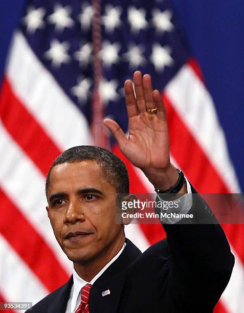 President Barack Obama waves at the conclusion of his speech at the U.S. Military Academy at West Point on December 1, 2009 in West Point, New York....