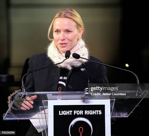 Actress and UNAIDS Goodwill Ambassador Naomi Watts speaks during the amfAR world AIDS day event at Washington Square Park on December 1, 2009 in New...