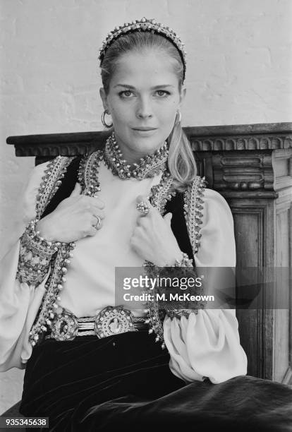 American actress and fashion model Candice Bergen wearing Slavonic outfit by Belinda Bellville, UK, 14th October 1968.