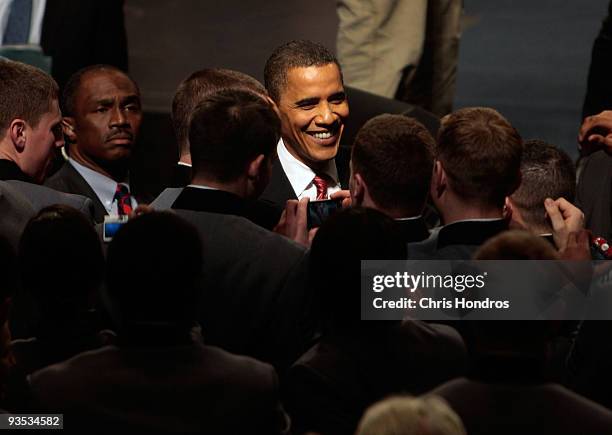 President Barack Obama shakes hands with cadets after speaking in Eisenhower Hall at the United States Military Academy at West Point December 1,...