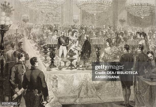 Napoleon III and Empress Eugenie at a gala dinner in the Gallery of Diana at the Tuileries, Paris, France, illustration from the magazine The...