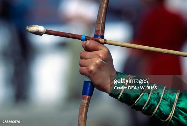 Archery, detail, Naadam festival, Ulan Bator, Mongolia.