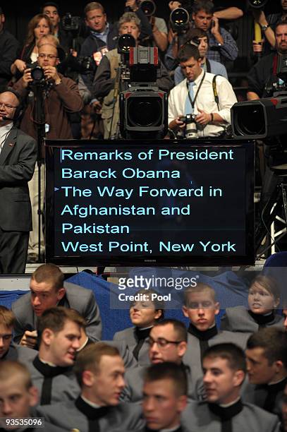 Army cadets and photographers wait for U.S. President Barack Obama to speak in Eisenhower Hall at the United States Military Academy at West Point...