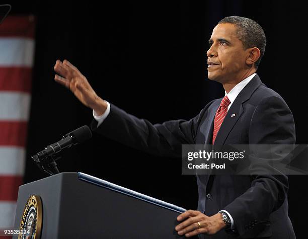 President Barack Obama waves after speaking in Eisenhower Hall at the United States Military Academy at West Point December 1, 2009 in West Point,...