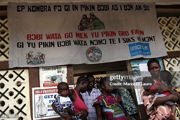 Women are seen waiting for HIV/AIDS volunteer testing and counseling during UNICEF Ambassador and Manchester United player Ryan Giggs visits at the...