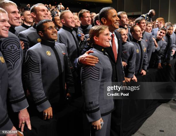 President Barack Obama is photographed with cadets after he spoke in Eisenhower Hall at the United States Military Academy at West Point December 1,...