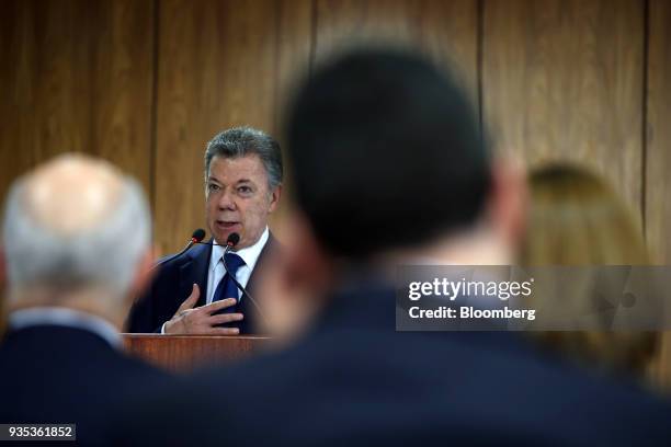 Juan Manuel Santos, Colombia's president, speaks during a joint press conference with Michel Temer, Brazil's president, not pictured, at the Planalto...