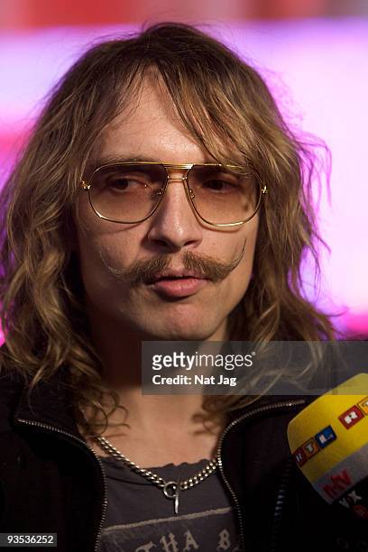 Musician Justin Hawkins attends the opening of the new Ed Hardy store at Westfield on December 1, 2009 in London, England.