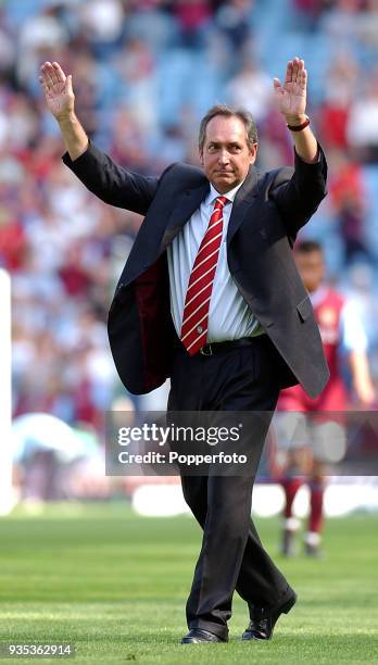 Liverpool manager Gerard Houllier celebrates victory at the end of the FA Barclaycard Premiership match between Aston Villa and Liverpool at Villa...