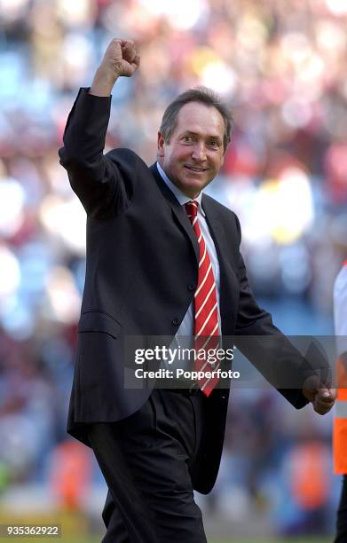 Liverpool manager Gerard Houllier celebrates victory at the end of the FA Barclaycard Premiership match between Aston Villa and Liverpool at Villa...