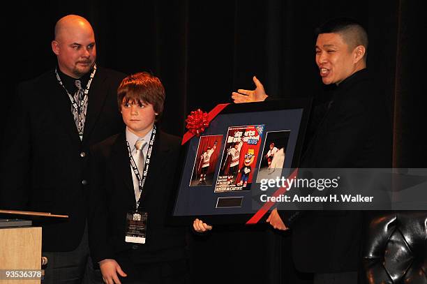 SportsKid of the Year Austin McCarthy and SI Kids Managing Editor, Bob Der onstage during the 2009 Sports Illustrated Sportsman of the Year...