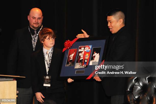 SportsKid of the Year Austin McCarthy and SI Kids Managing Editor, Bob Der onstage during the 2009 Sports Illustrated Sportsman of the Year...