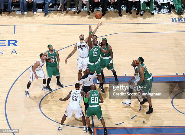 Tyson Chandler of the Charlotte Bobcats jumps against Shelden Williams of the Boston Celtics on December 1, 2009 at the Time Warner Cable Arena in...