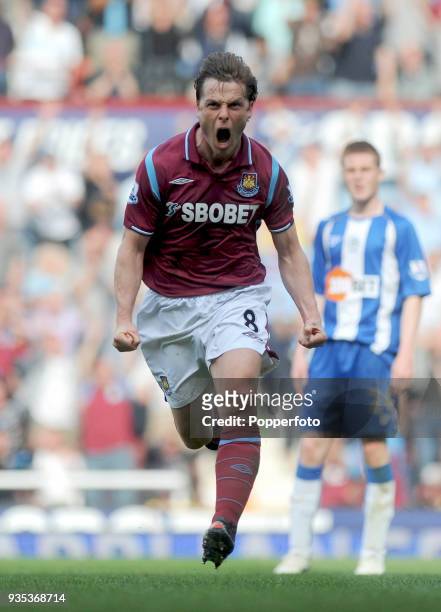 Scott Parker of West Ham United celebrates after scoring the winning goal during the Barclays Premier League match between West Ham United and Wigan...
