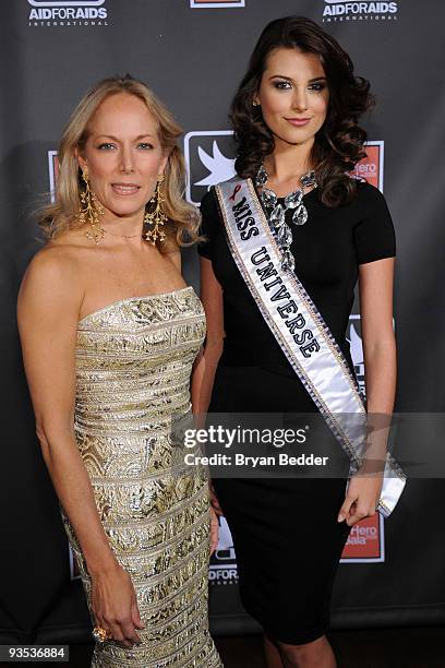 President of the board for AID FOR AIDS International Maria Eugenia Maury Arria and Miss Universe Stefania Fernandez attend the AID FOR AIDS...