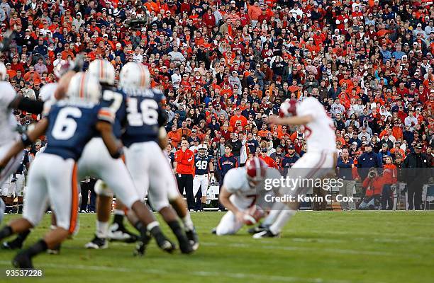 Fans look on during an field goal by the Alabama Crimson Tide against the Auburn Tigers at Jordan-Hare Stadium on November 27, 2009 in Auburn,...