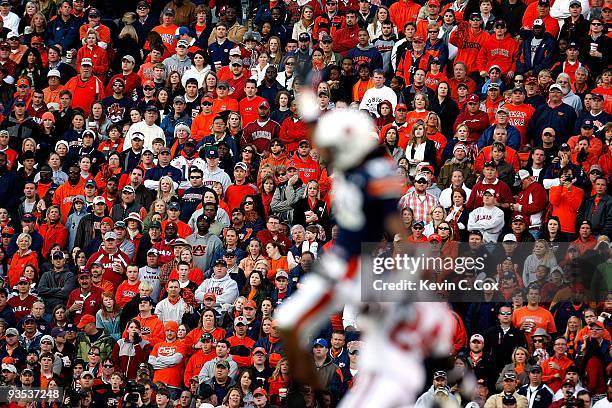 Fans look on during a incomplete reception in the game between the Alabama Crimson Tide and the Auburn Tigers at Jordan-Hare Stadium on November 27,...