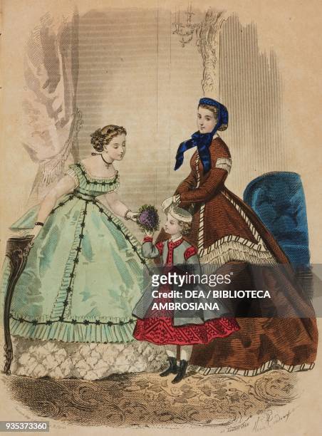 Girl wearing a white tulle and green crepe dress, woman wearing a silk city dress, four-five year-old girl wearing a cashmere and poplin dress,...