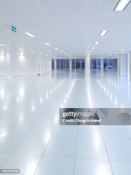 empty modern office floor space - doug armand stockfoto's en -beelden