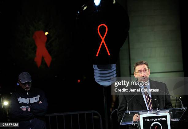 Deputy Executive Director Paul DeLay speaks during the amfAR World AIDS day event at Washington Square Park on December 1, 2009 in New York City.