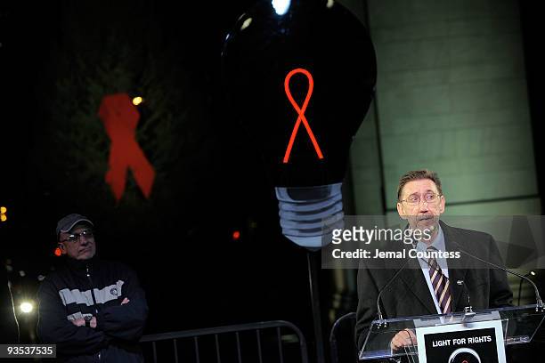 Deputy Executive Director Paul DeLay speaks during the amfAR World AIDS day event at Washington Square Park on December 1, 2009 in New York City.