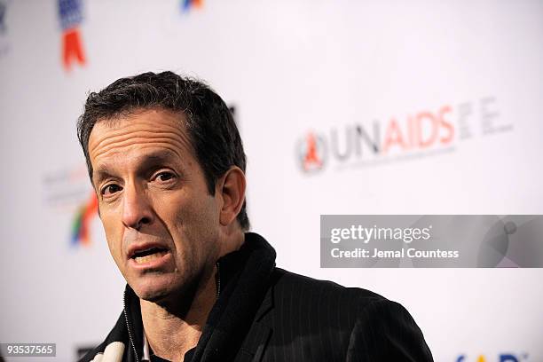 Chairman of the Board of Trustees for amfAR Kenneth Cole speaks to the media during the amfAR world AIDS day event at Washington Square Park on...