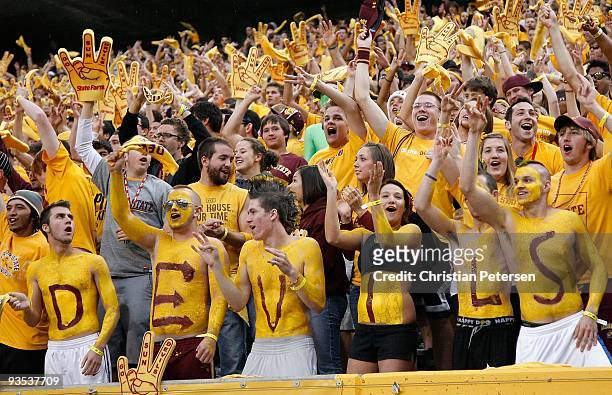Fans of the Arizona State Sun Devils cheer during the college football game against the Arizona Wildcats at Sun Devil Stadium on November 28, 2009 in...