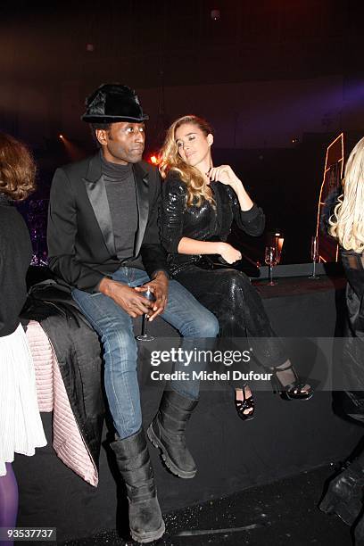 Keziah Jones and Vahina Jocante attend the Sonia Rykiel & H&M Underwear Collection Launch Party at Grand Palais on December 1, 2009 in Paris, France.