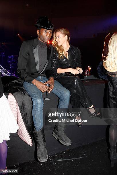 Keziah Jones and Vahina Jocante attend the Sonia Rykiel & H&M Underwear Collection Launch Party at Grand Palais on December 1, 2009 in Paris, France.