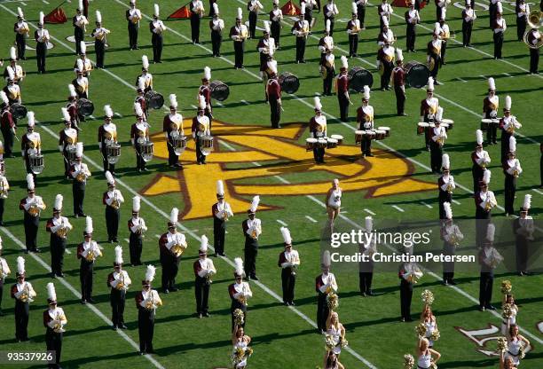 The Arizona State Sun Devils marching band and cheerleaders perform before the college football game against the Arizona Wildcats at Sun Devil...