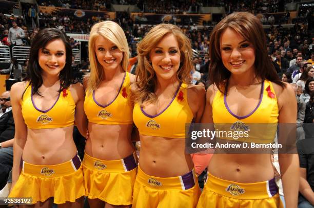 The Los Angeles Laker Girls wear red ribbons marking World AIDS Awareness Day before a game against the New Orleans Hornets at Staples Center on...