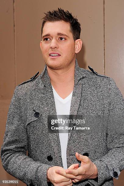 Musician Michael Buble leaves the "Live With Regis And Kelly" taping at the ABC Lincoln Center Studios on December 01, 2009 in New York City.