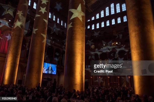 President Donald Trump delivers remarks at the National Republican Congressional Committee March Dinner at the National Building Museum on March 20,...