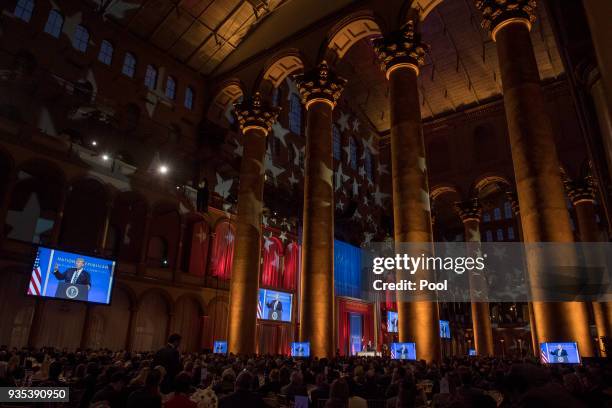 President Donald Trump delivers remarks at the National Republican Congressional Committee March Dinner at the National Building Museum on March 20,...