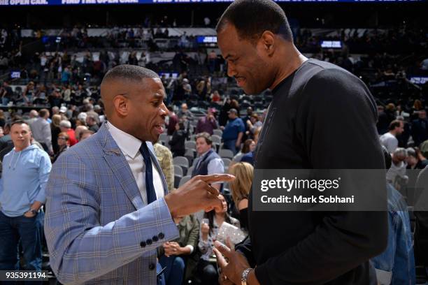 Antonio Daniels and David Robinson speak after the San Antonio Spurs v New Orleans Pelicans game on March 15, 2018 at the AT&T Center in San Antonio,...