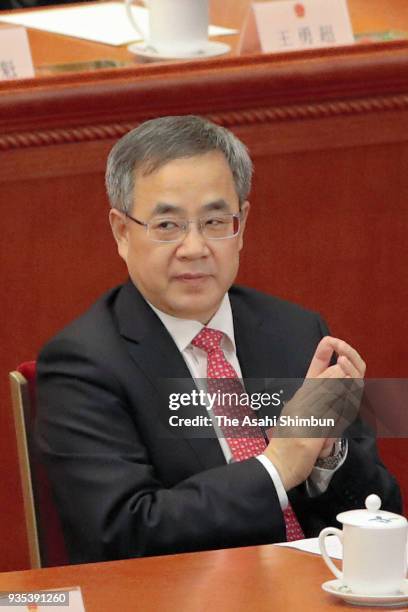 Vice Premier Hu Chunhua attends the seventh plenary session of the 13th National People's Congress at the Great Hall of the People on March 19, 2018...