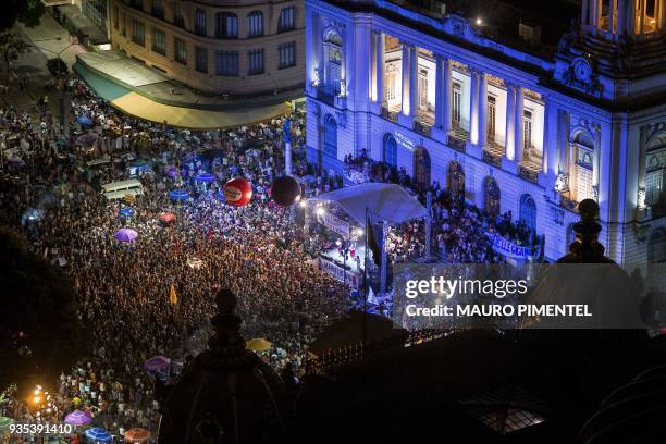 Protesters attend a demonstration against the murder of Brazilian councilwoman and activist Marielle Franco in front of Rio's Municipal Chamber, Rio...