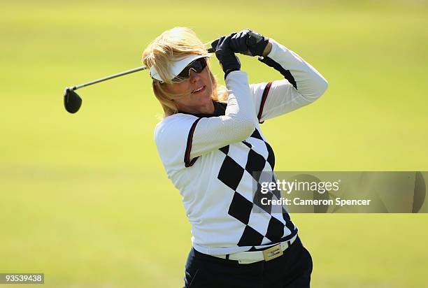 Television personality Kerri Anne Kennerley plays a shot during the pro-am ahead of the 2009 Australian Open Golf Championship at New South Wales...