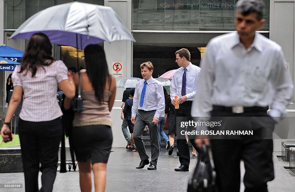 Two expatriate western businessmen (C) w