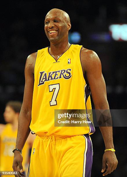 Lamar Odum of the Los Angeles Lakers laughs after a timeout call against the New Orleans Hornets during the second half at Staples Center on December...