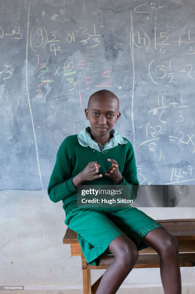 Deaf children learning sign language at school.