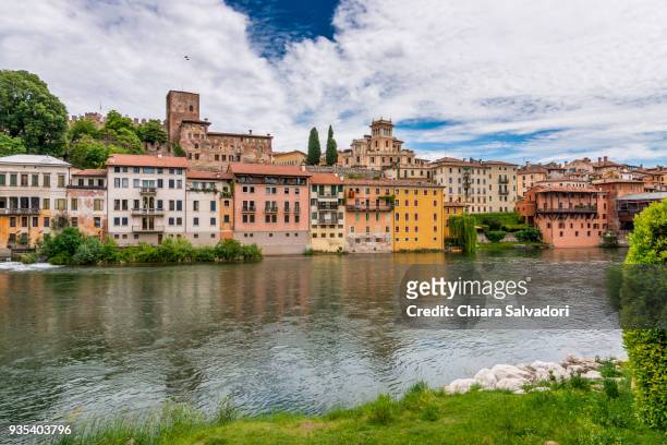 a view of bassano del grappa along the river brenta - bassano del grappa stock pictures, royalty-free photos & images