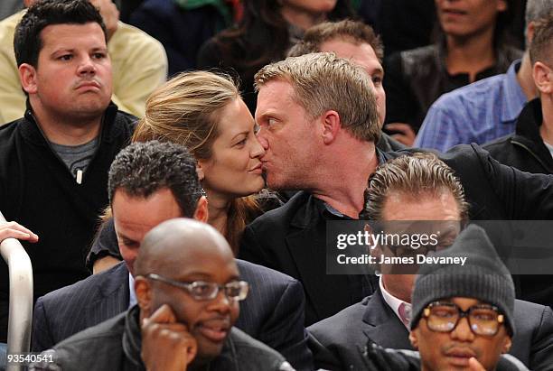 Anthony Michael Hall and girlfriend attend the Knicks vs the Phoenix Suns Game at Madison Square Garden on December 1, 2009 in New York City.